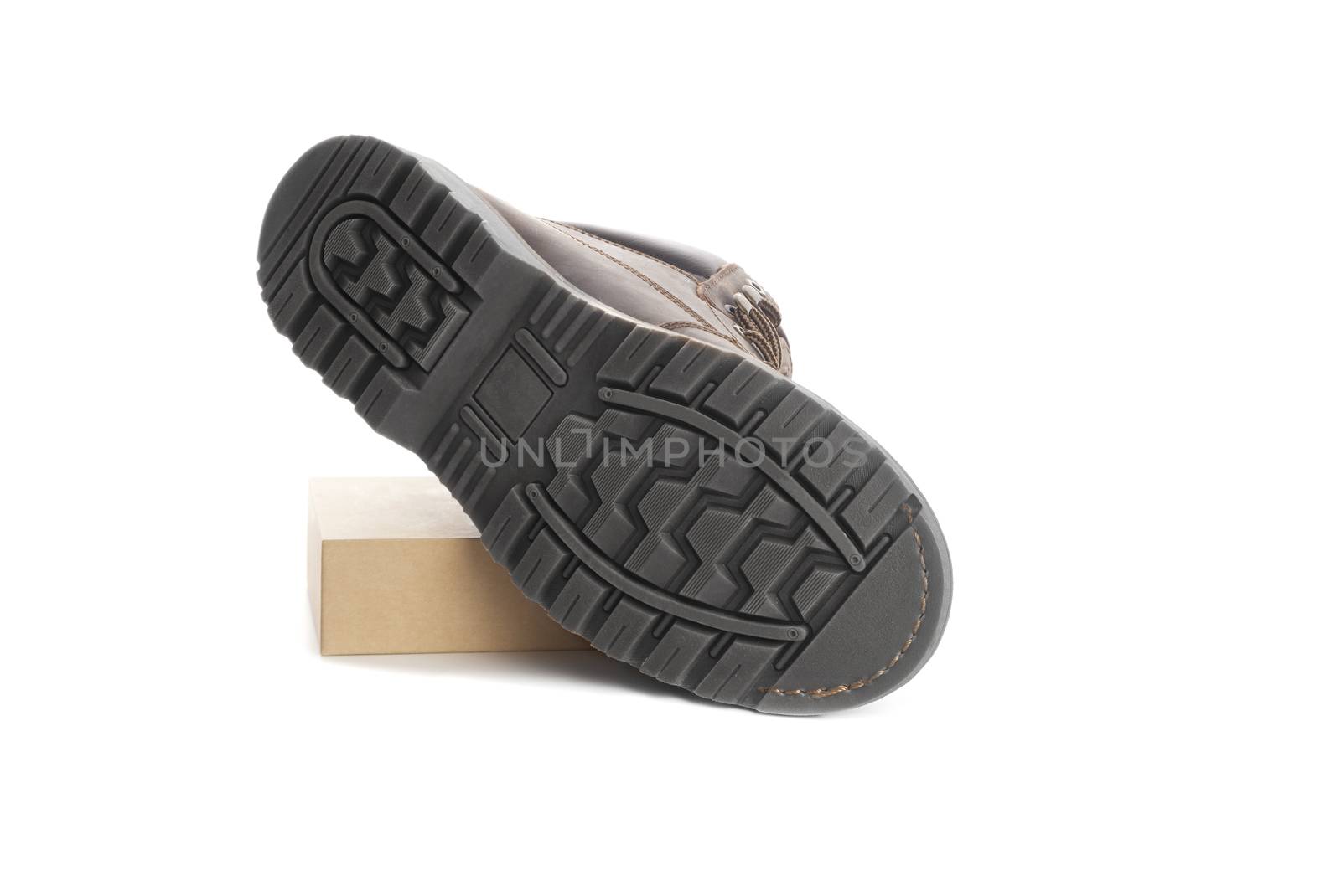 Black shoe sole. Isolated on a white by SlayCer