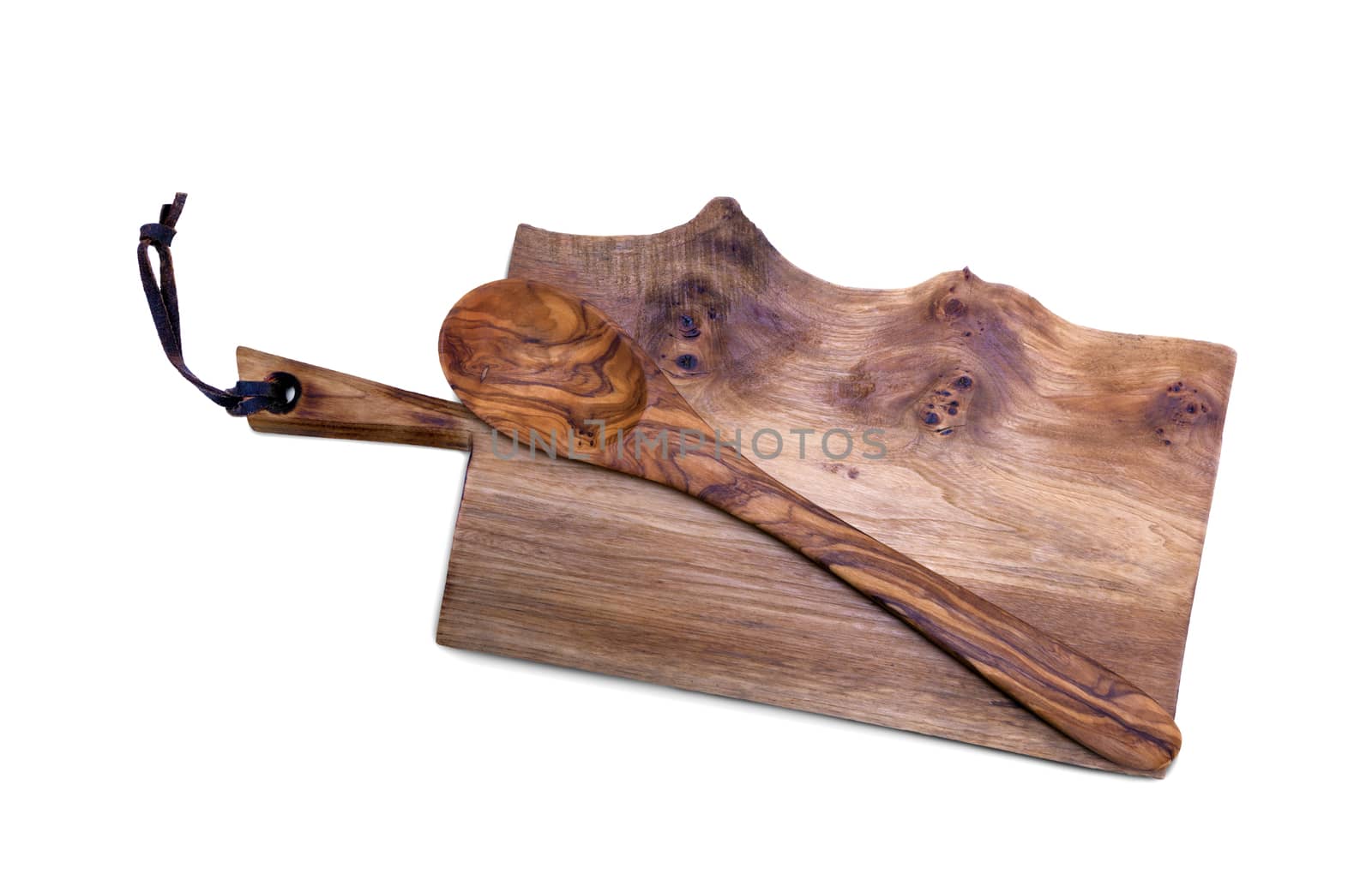 Cutting the old wooden board with a wooden spoon. On a white background. Isolated, close-up.