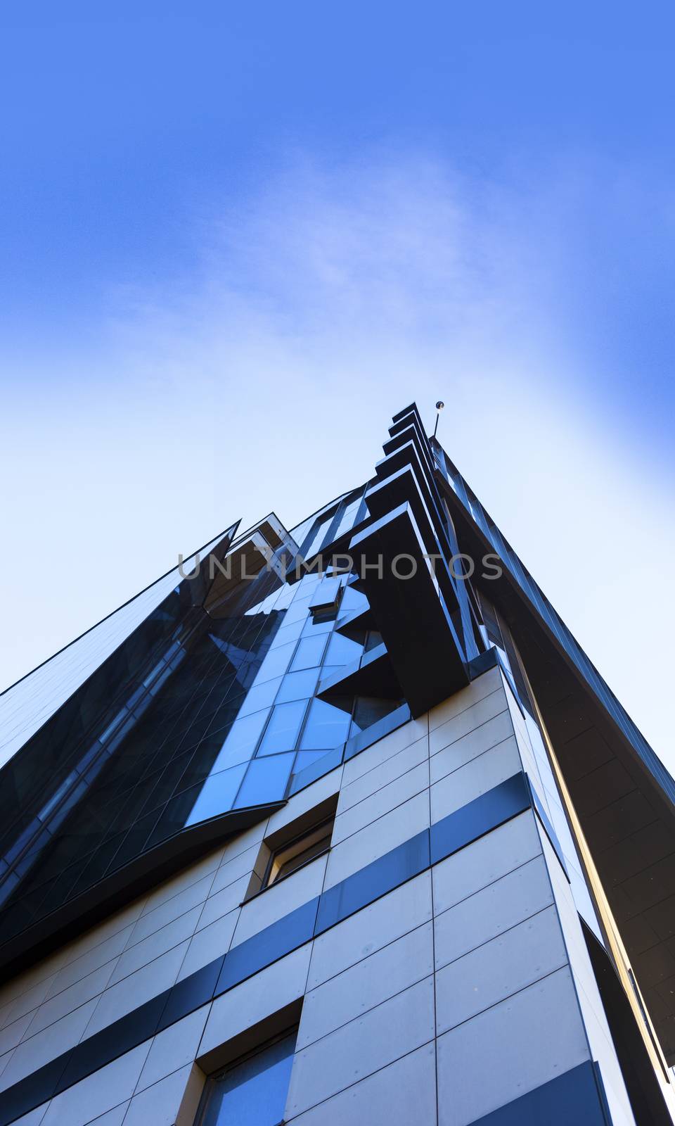 Beautiful skyscraper with architecture and glass window exterior of building around business area in the city. Closeup