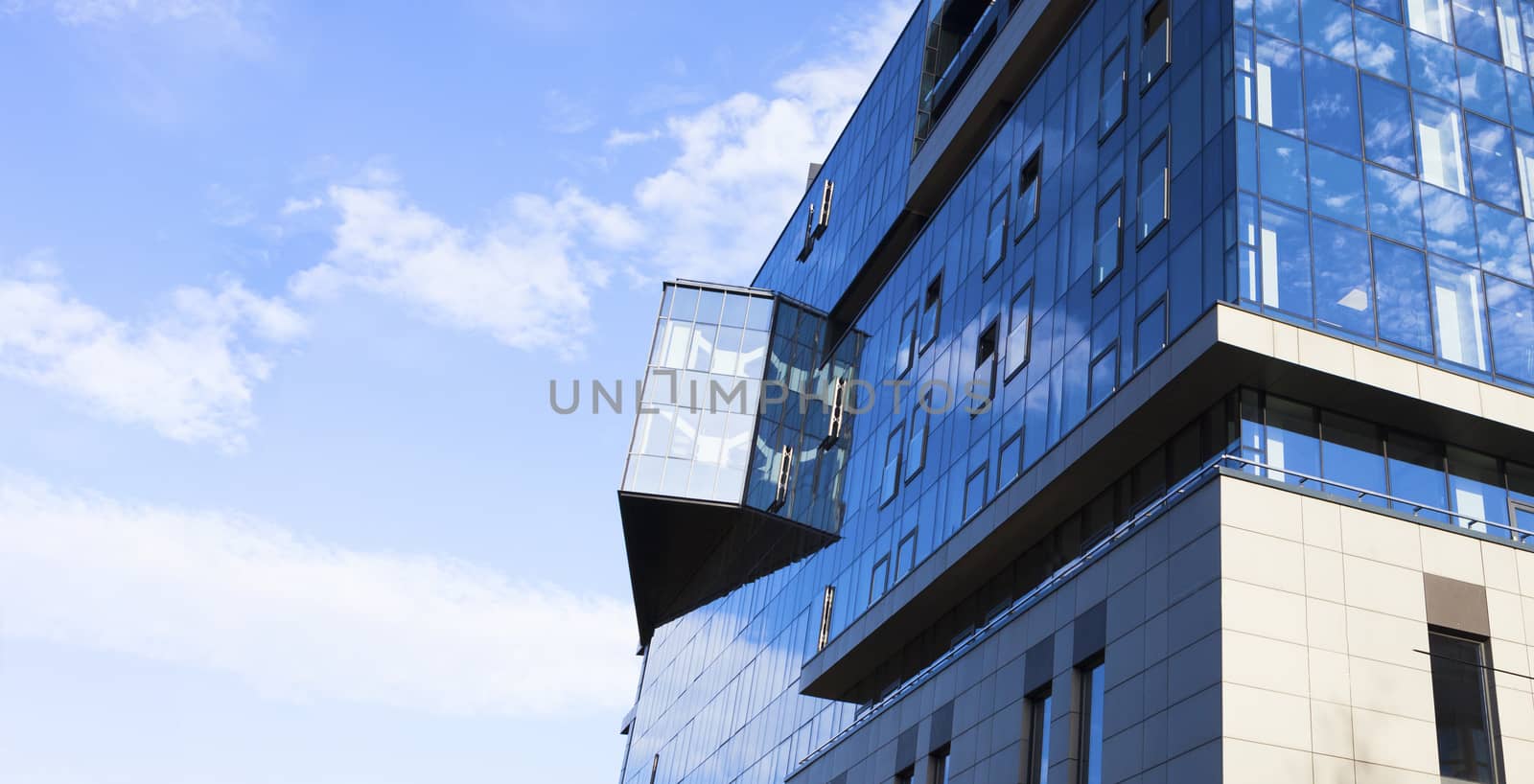 Beautiful skyscraper with architecture and glass window exterior of building around business area in the city. Closeup