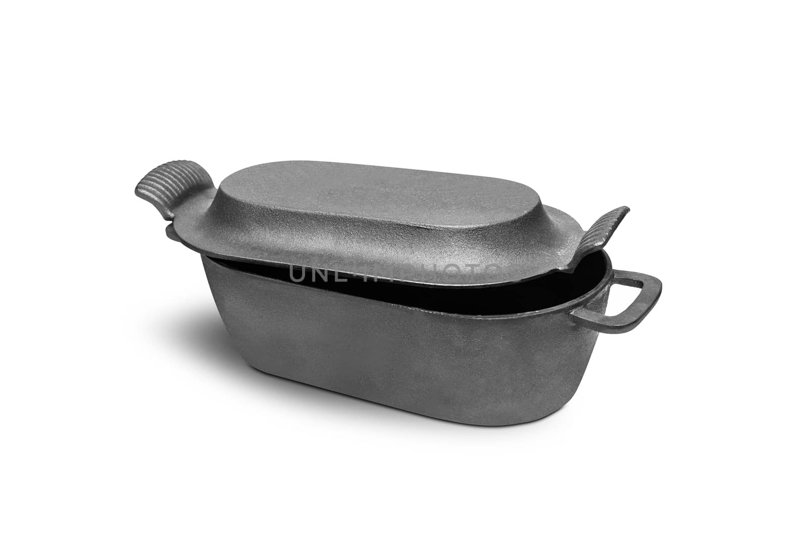 Cast iron pan with lid. Isolated on white background. With clipping path