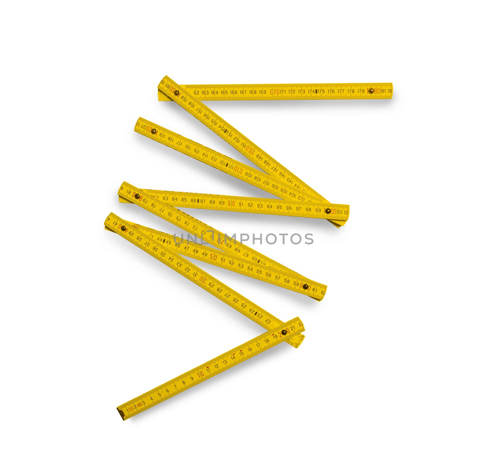 Yellow folding rule measuring tool isolated on white background