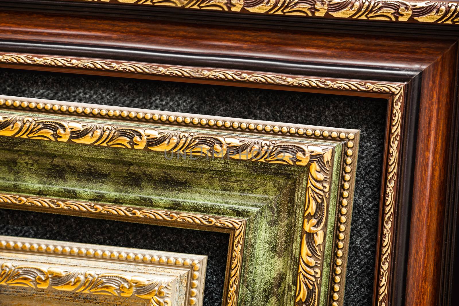 Lined up old wooden vintage art frames. Close-up fragment. For promotional image