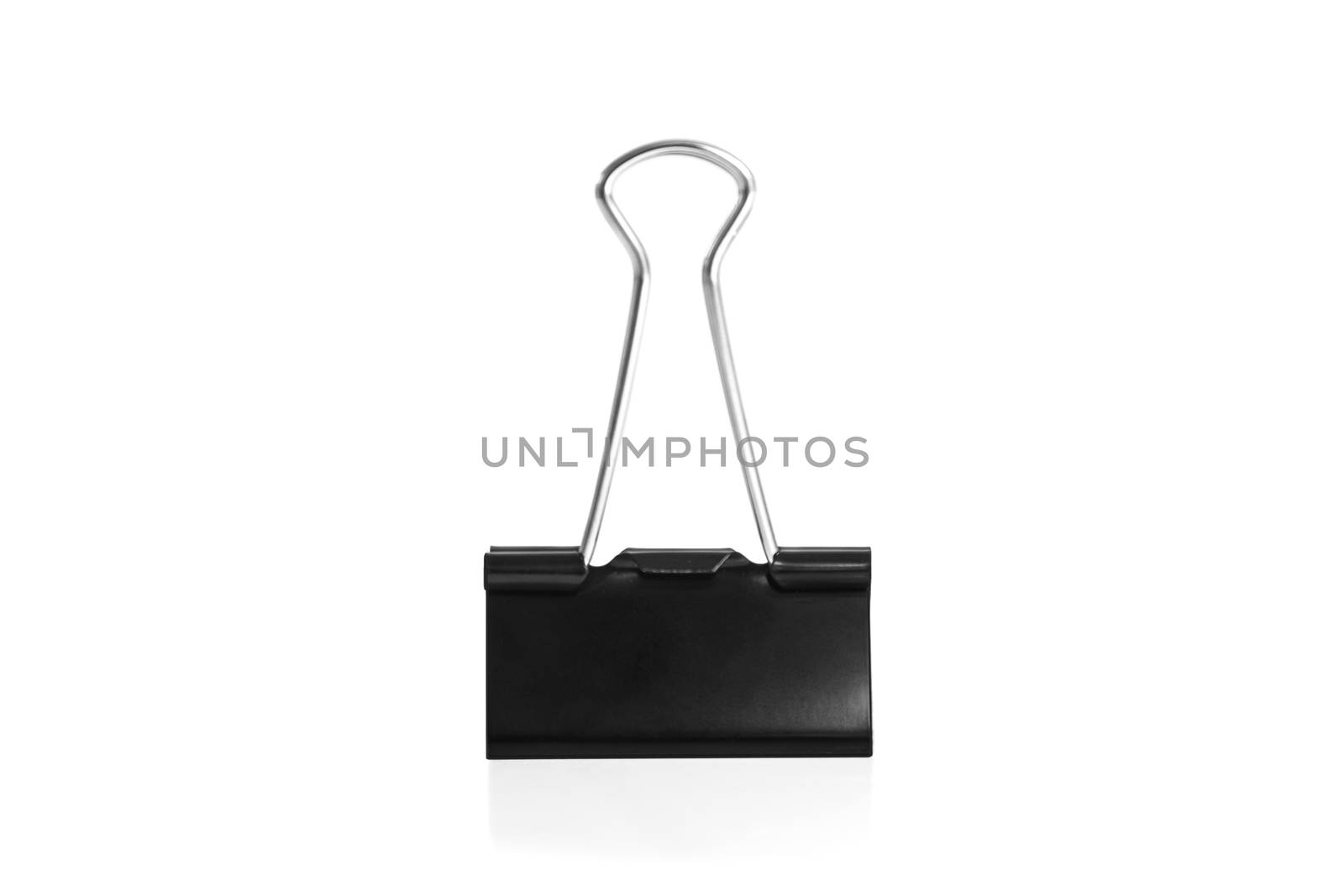 Paper clip isolated from white background. A paperclip is a device for office use to clamp a device such as paper and more.