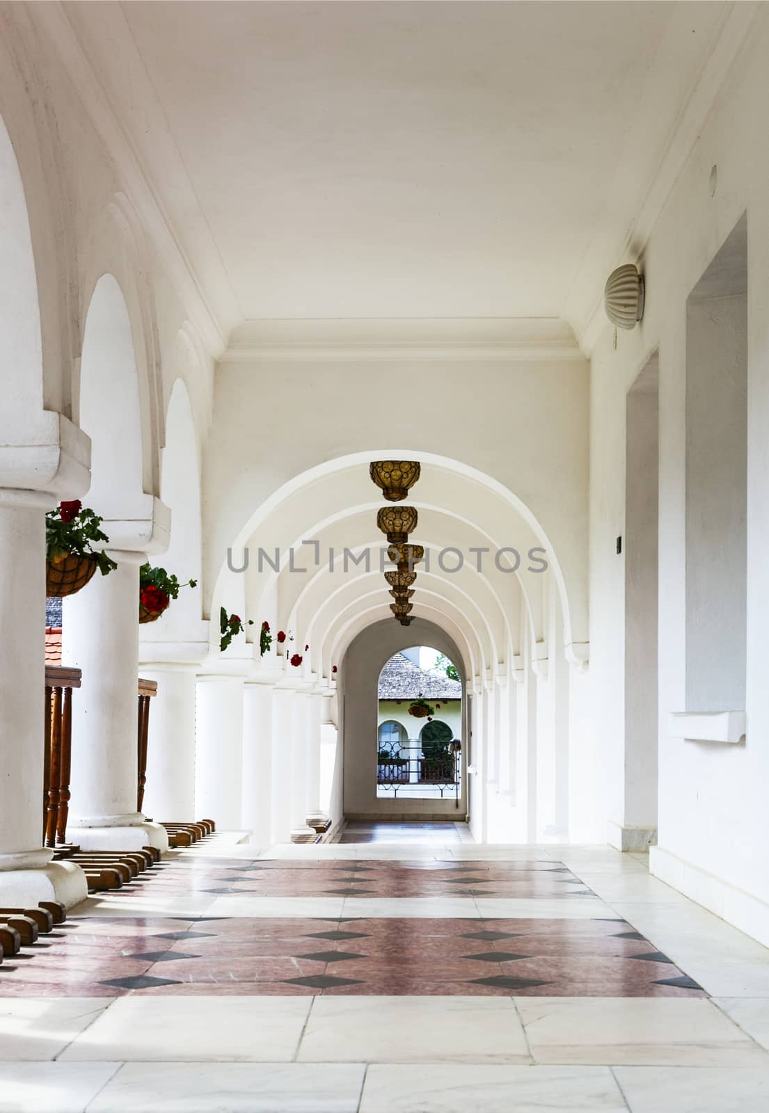 Chisinau, Moldova 29 June 2018: Arched colonade hallway at Sambata de Sus monastery in Transylvania, Romania