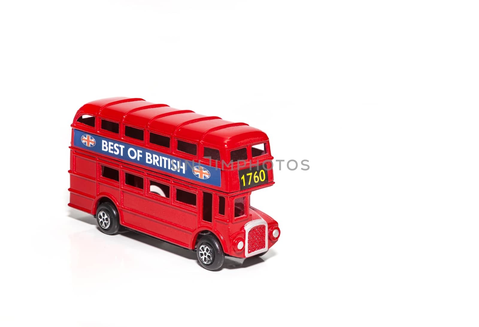 CHISINAU, MOLDOVA - May 01, 2018: Red Double-decker bus miniature toy. London traditional souvenirs and popular city symbols. Isolated on white background