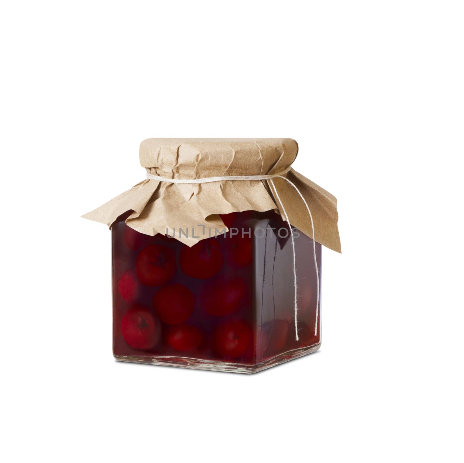 Cherry compote in a glass jar. Isolated on white background. With clipping path