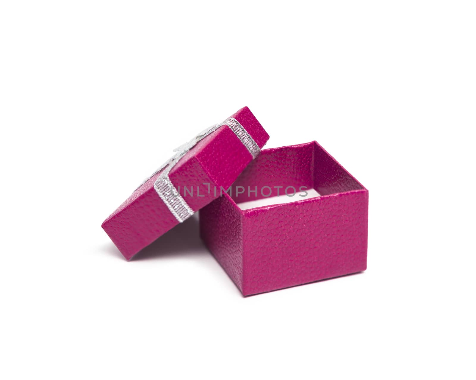 Open rose color gift box with silver ribbon isolated on white background