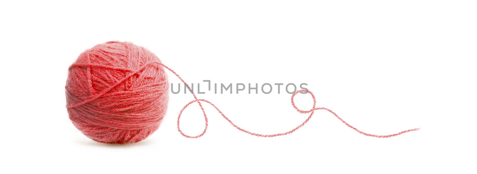 Red ball of Threads wool yarn isolated on white background