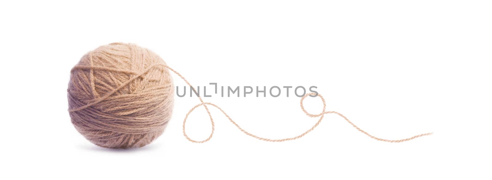 Brown ball of Threads wool yarn isolated on white background