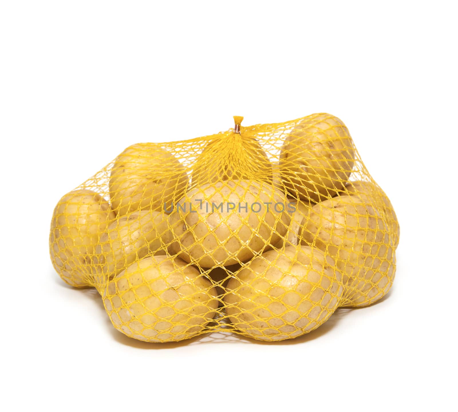 Potatoes fresh in the package isolated on white background