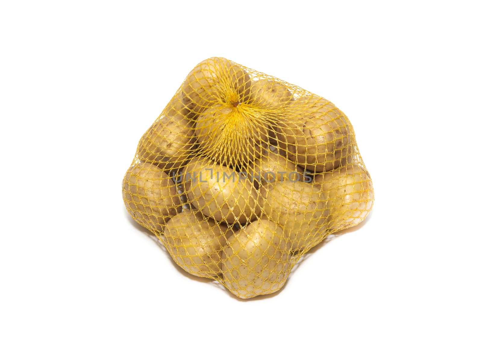 Potatoes fresh in the package isolated on white background