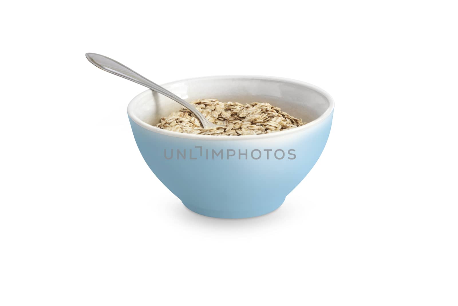 Food. Oatmeal or dry cereal in a blue bowl. Isolated on white background. With clipping path