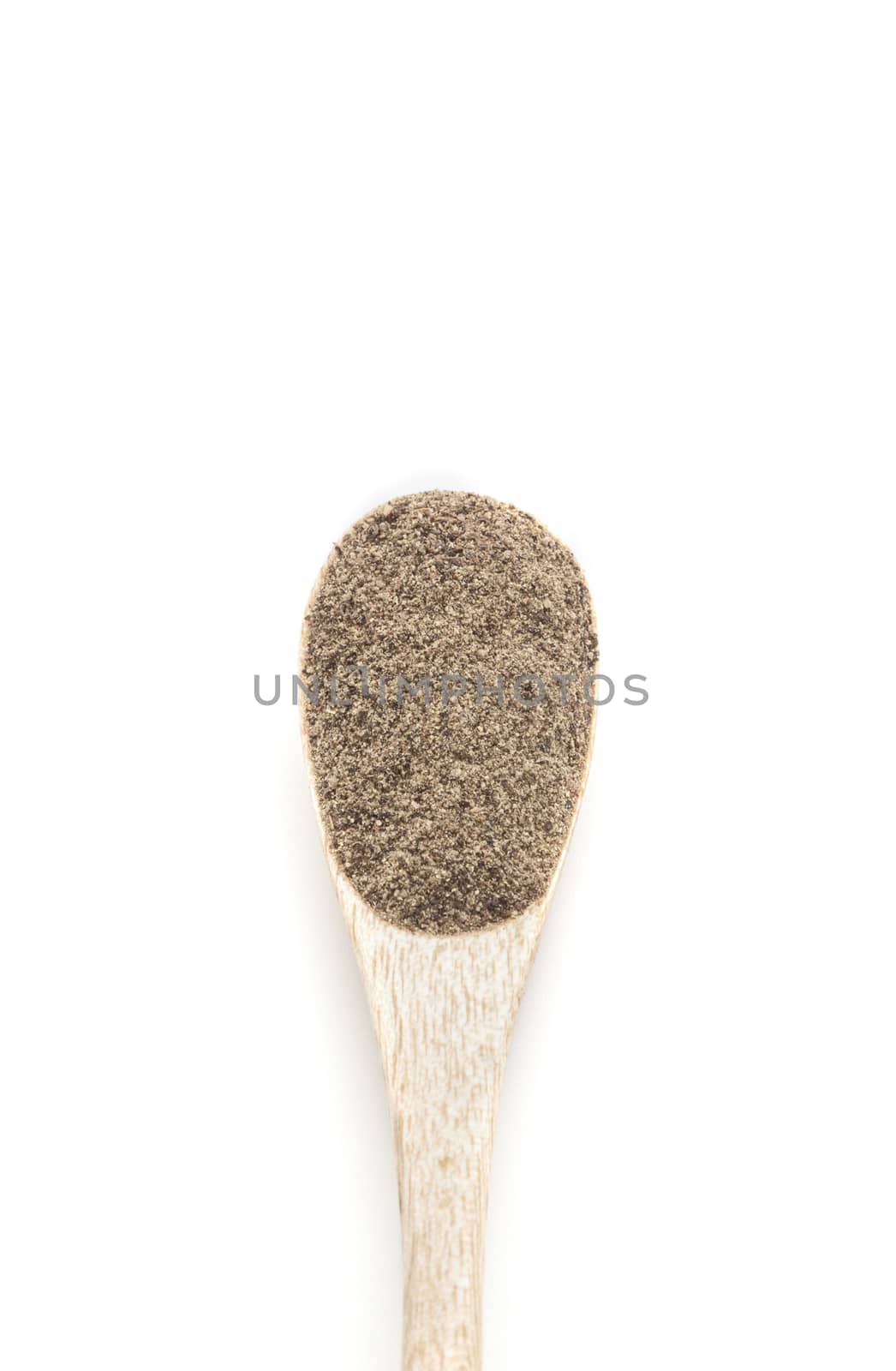 Ground black Pepper spices in wooden spoon isolated on white background