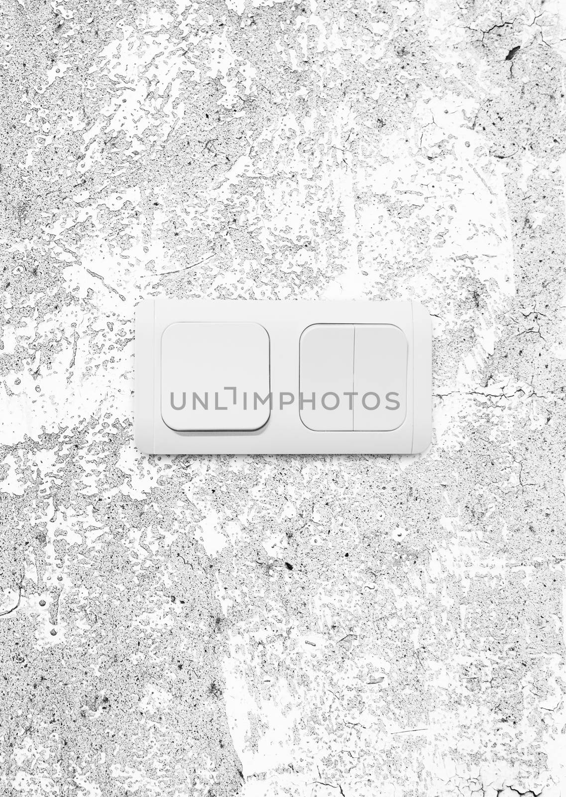 Electric switch of the three buttons on the wall. With clipping path