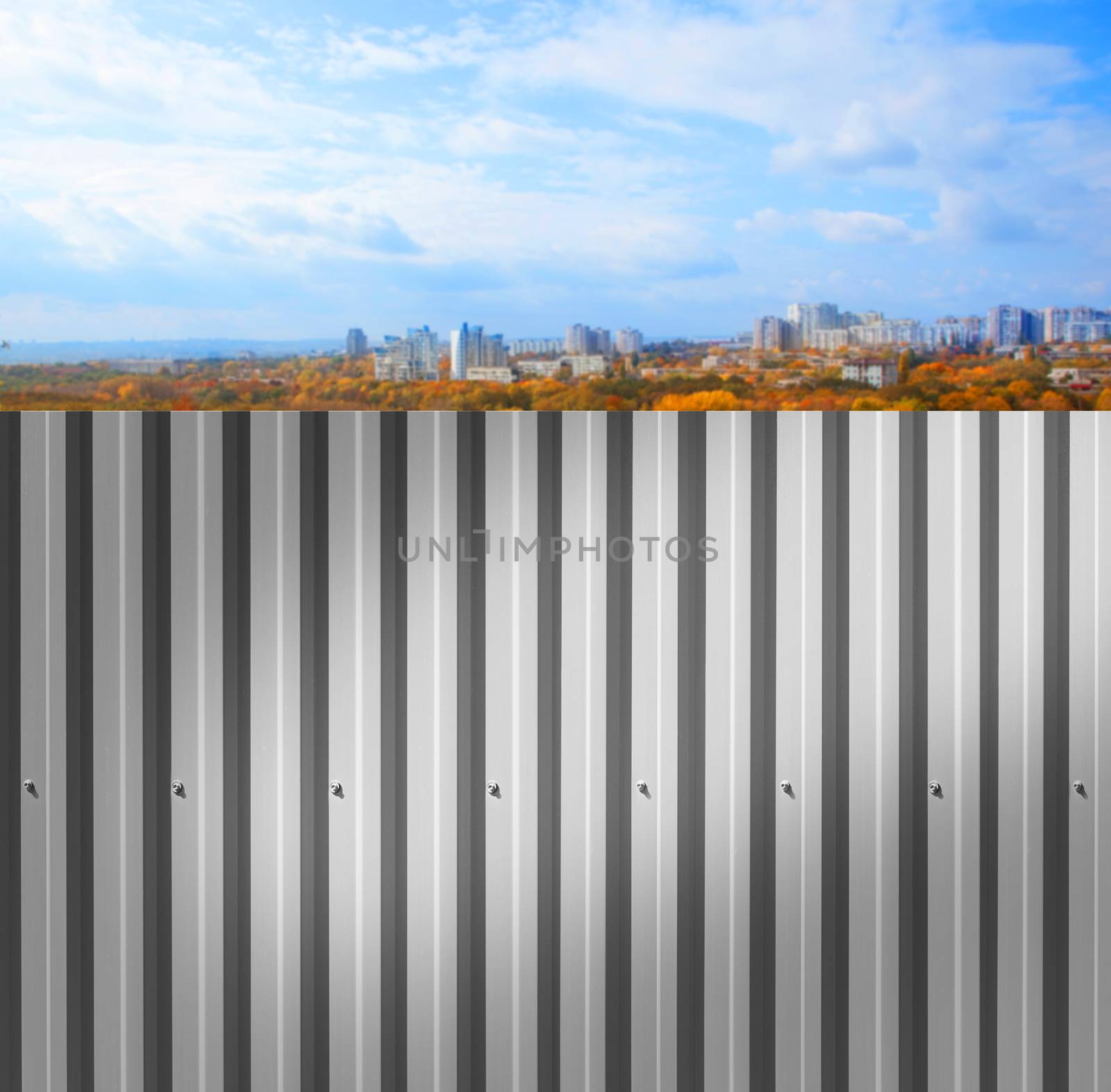 Background of an iron fence with screws