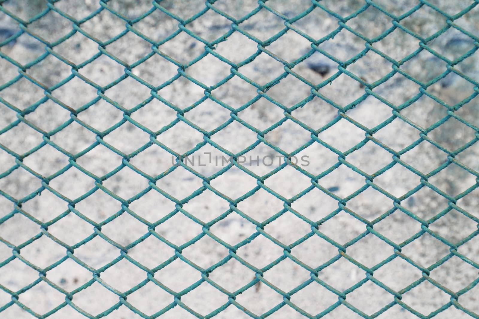 Rusty fence of color metal mesh background