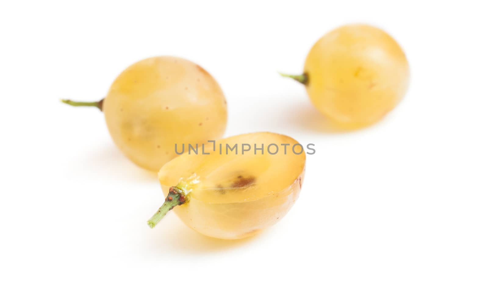 Grapes white ripe slices fresh. Close-up shot. Macro not in focus. Isolated on white background.