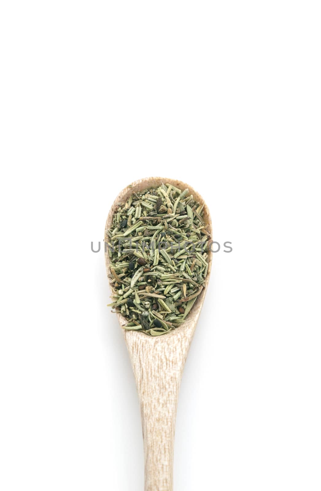 Rosemary dried spices in wooden spoon isolated on white background