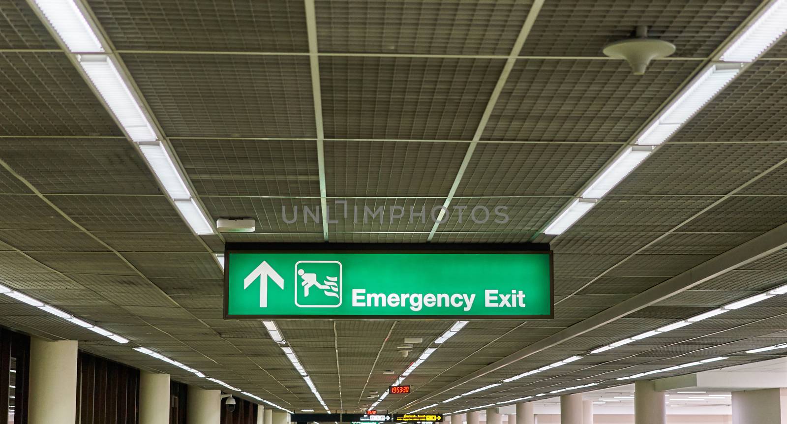 Emergency exit information board sign international airport terminal by eaglesky