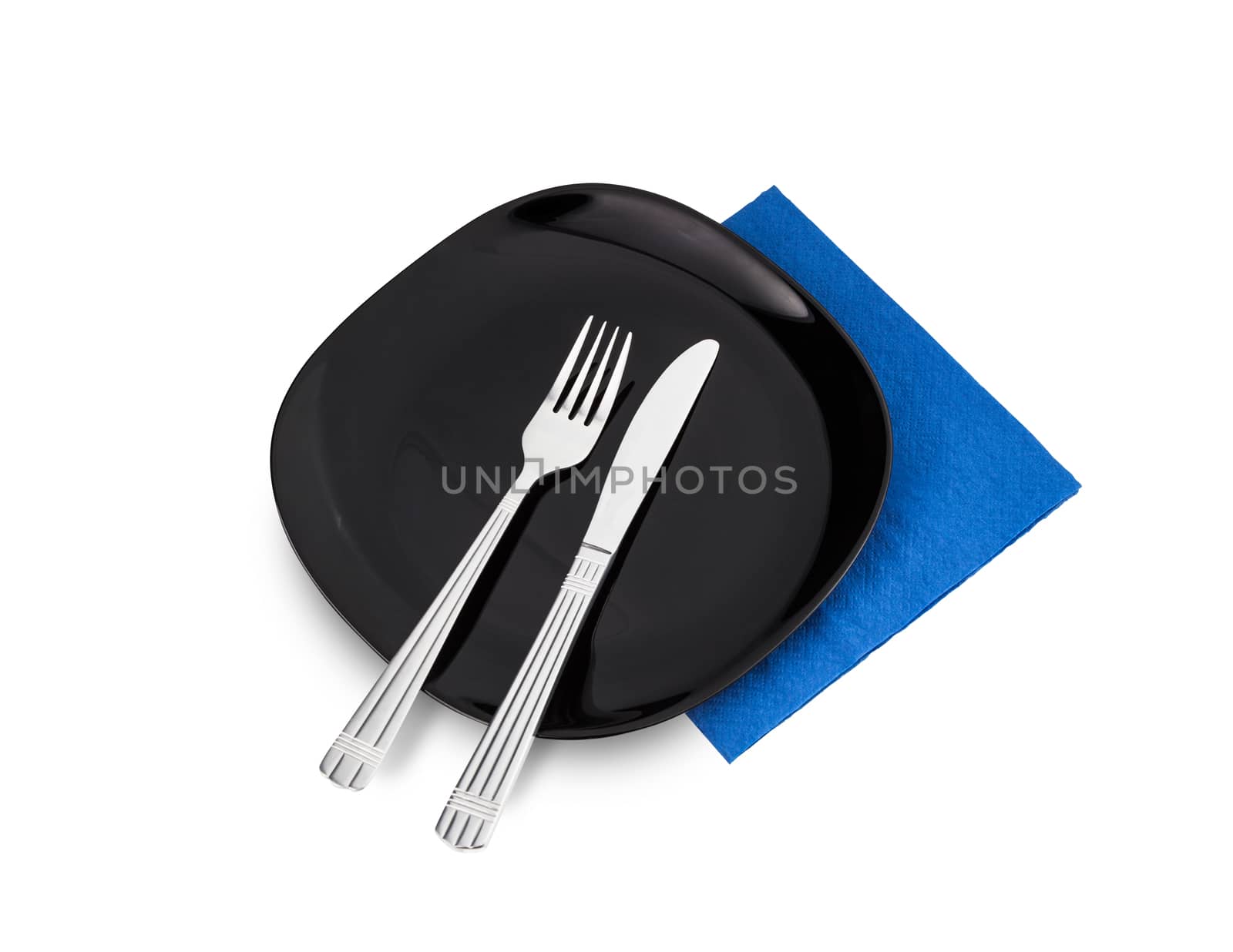 Black plate, fork and knife on blue napkin. Isolated on white. With clipping path