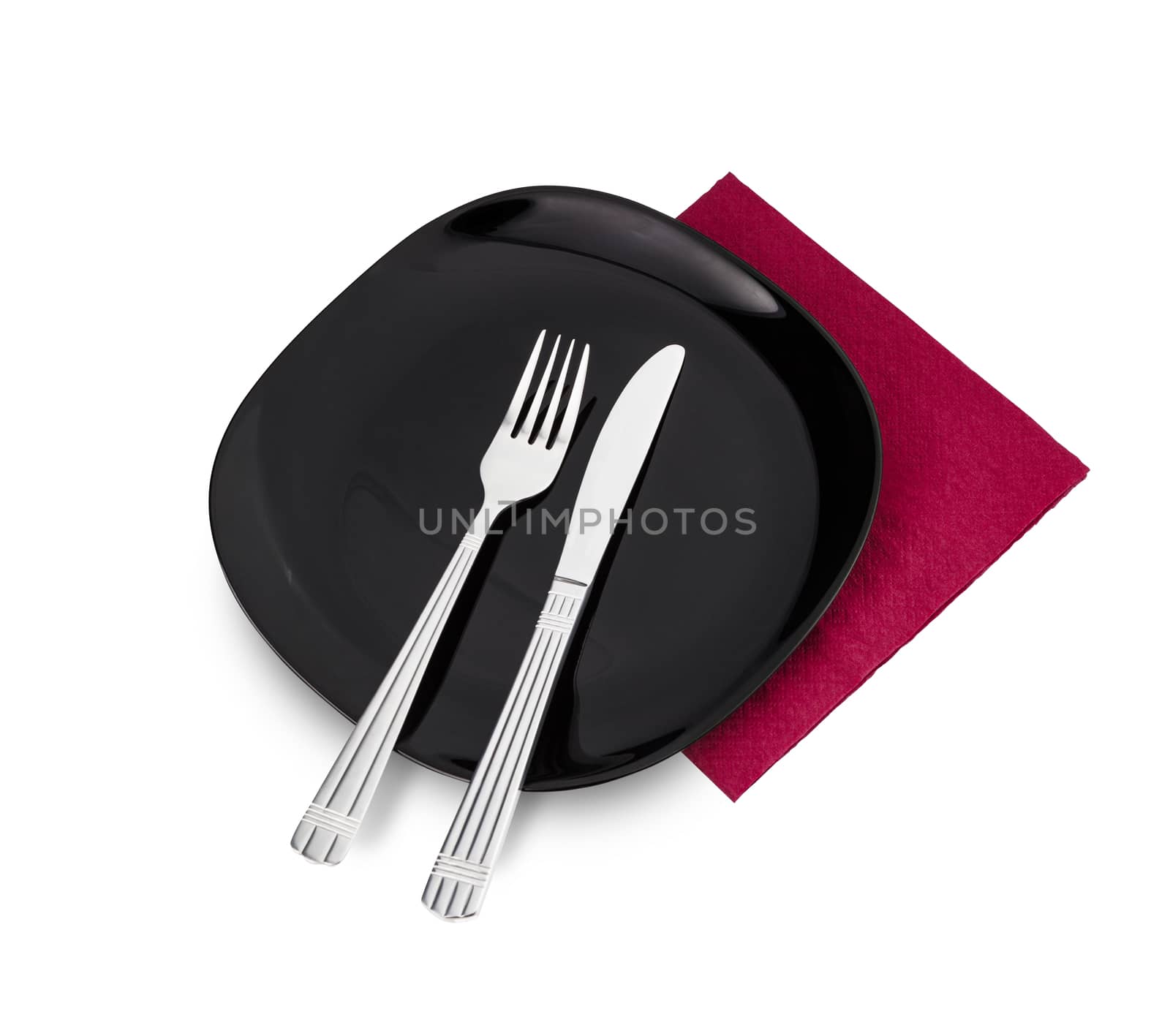 Black plate, fork and knife on Red napkin. Isolated on white. With clipping path