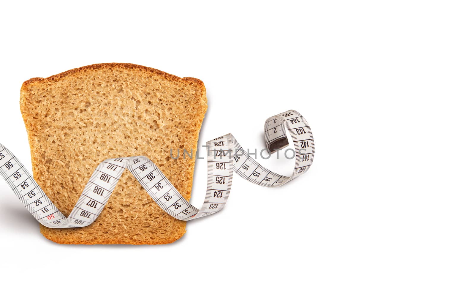Wheat bread piece with the measuring tape on white background. Concept of health care.