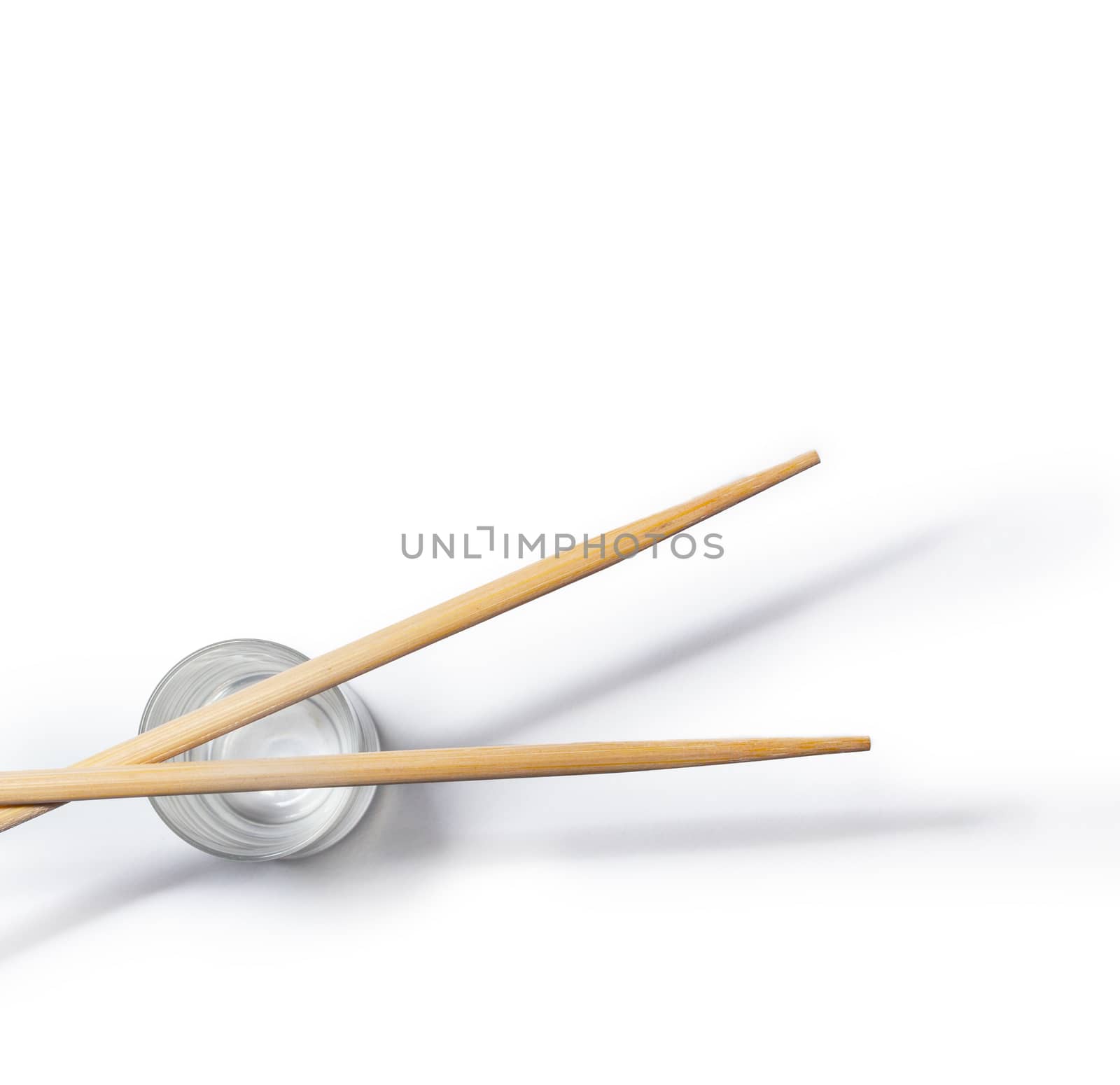 Wooden chopsticks isolated on white background by SlayCer