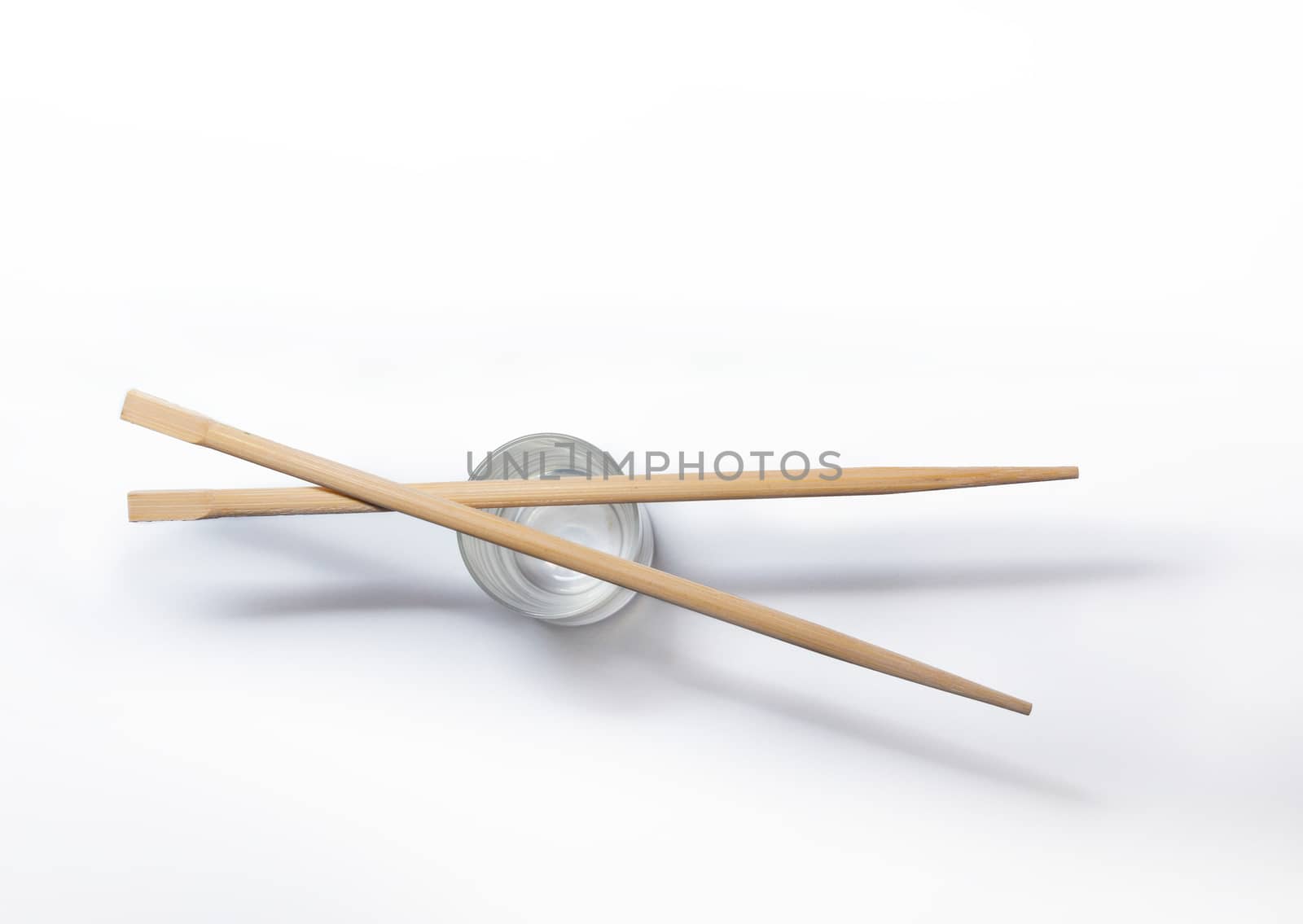 Wooden chopsticks isolated on white background