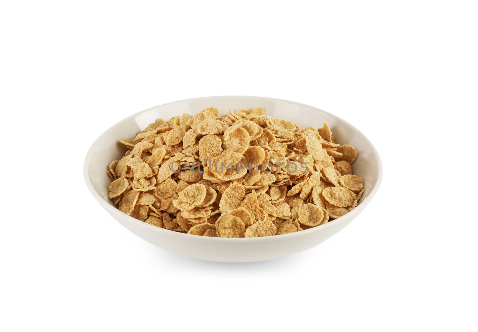 Corn flakes isolated in a plate on white background. With clipping path.