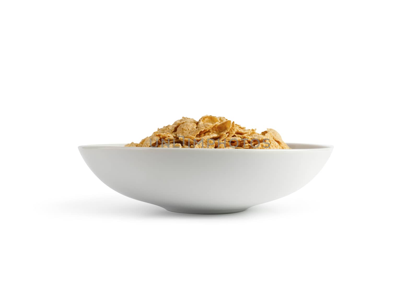 Corn flakes isolated in a plate on white background. With clipping path.