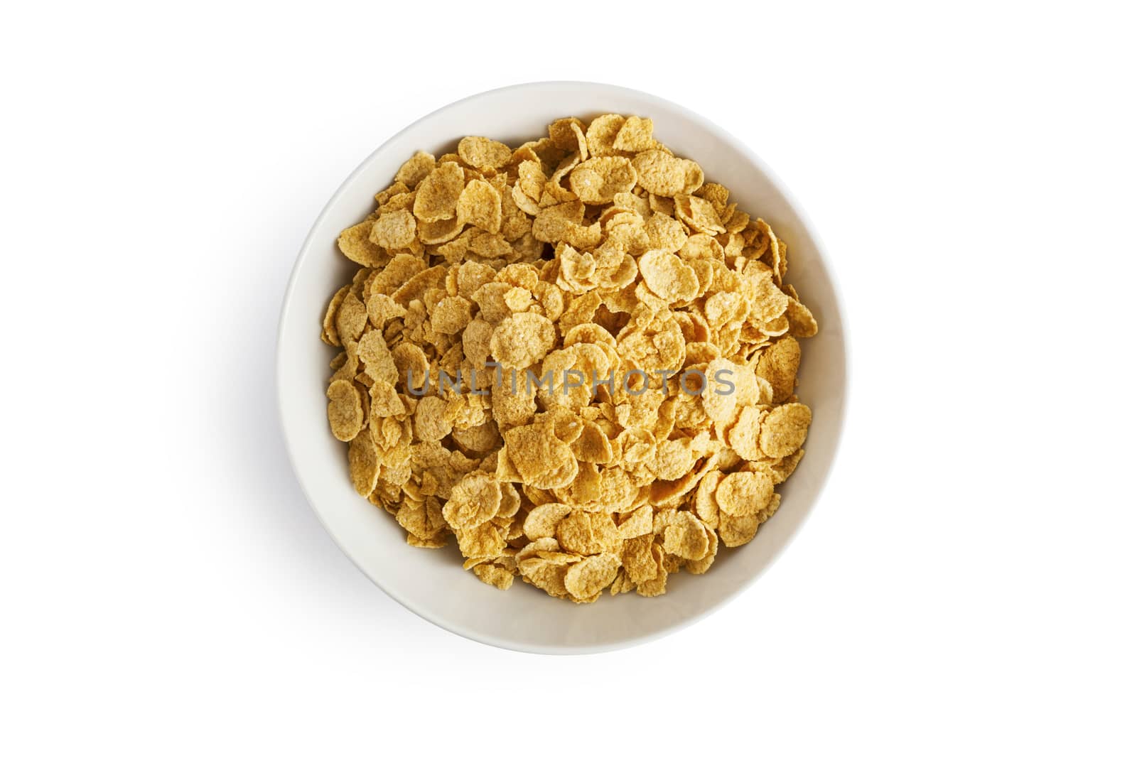 Corn flakes isolated in a plate on white background. With clipping path.