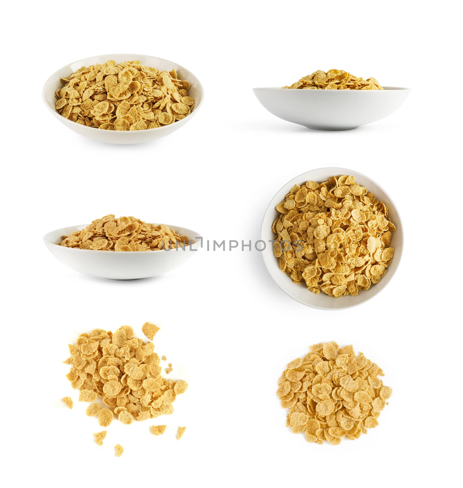 Corn flakes set isolated in a plate on white background. With clipping path.