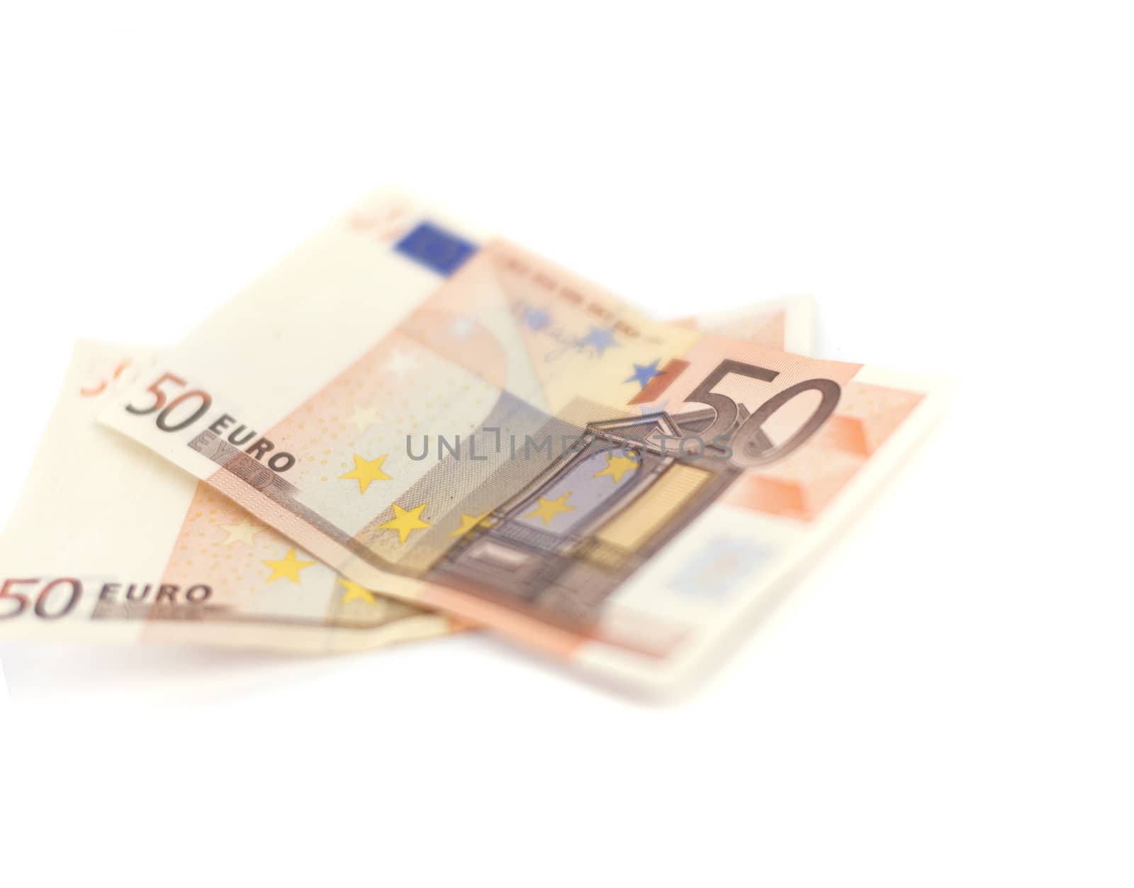 Euro money banknotes isolated on white background. Blurred concept