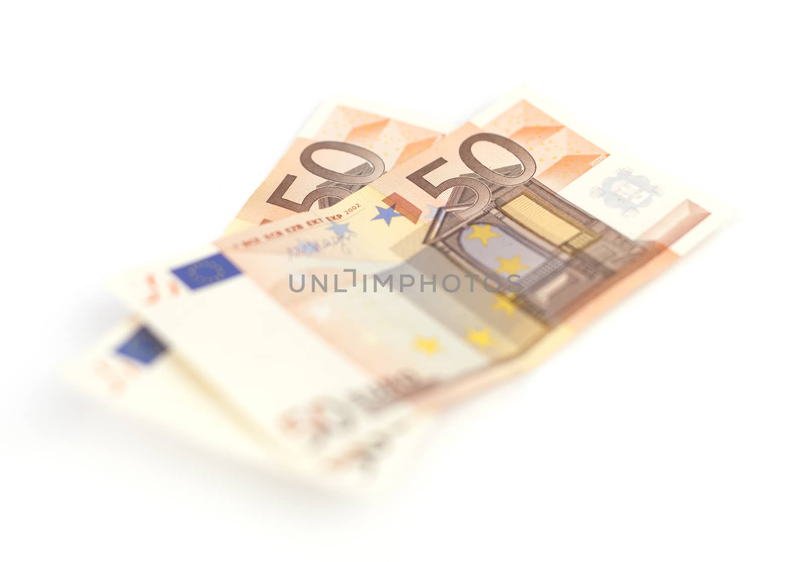 Euro money banknotes isolated on white background. Blurred concept