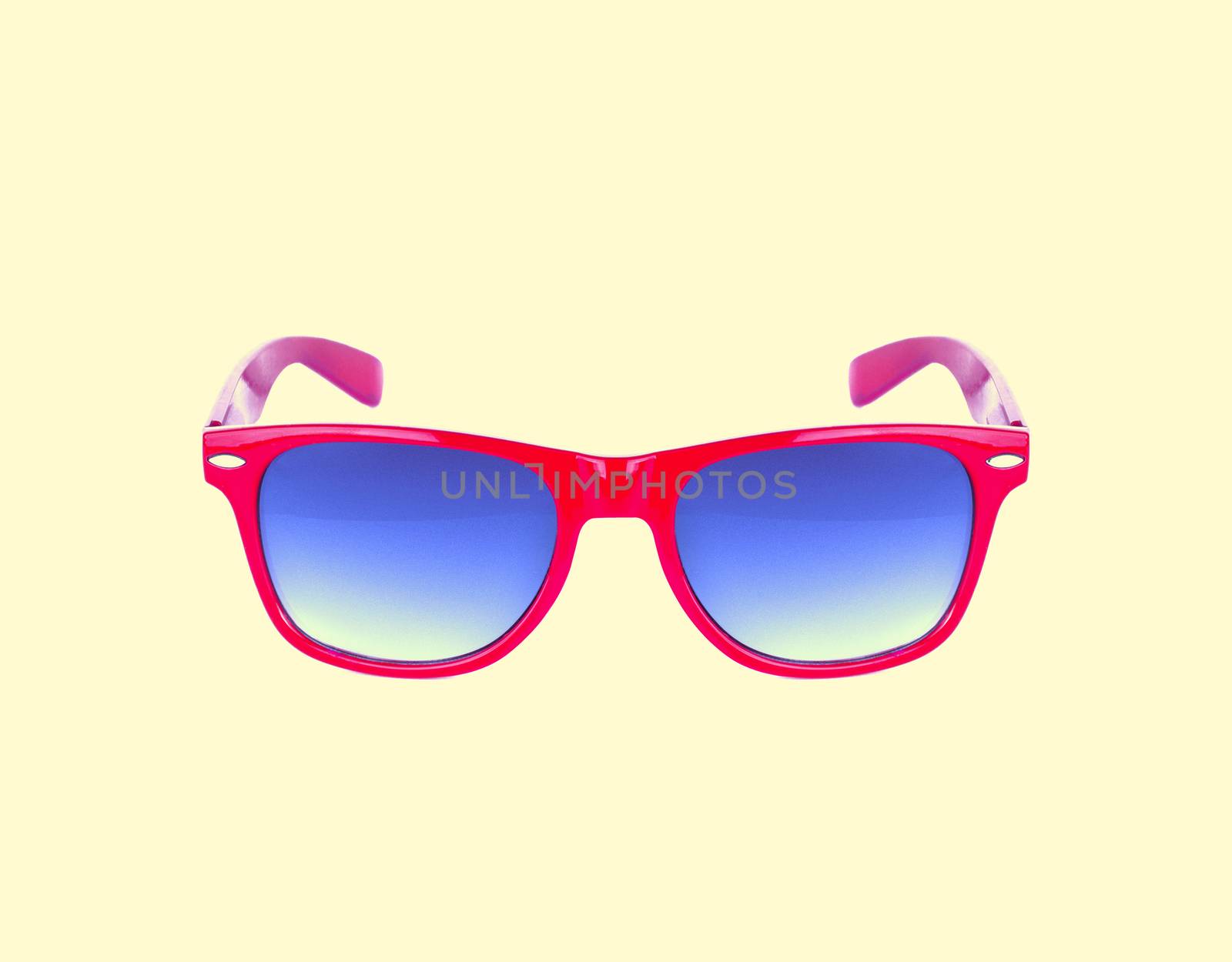 Red sun glasses isolated over the yellow background