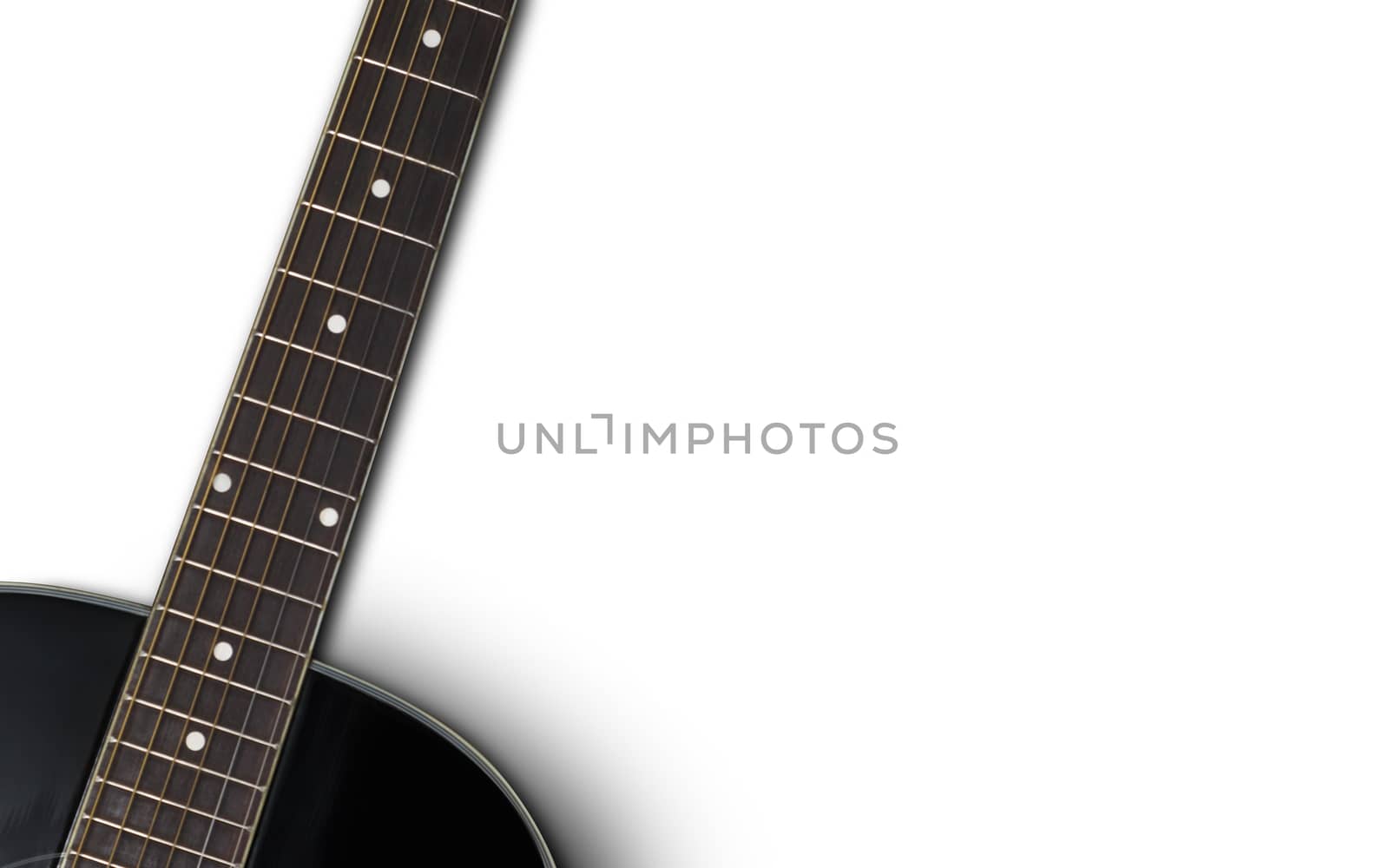 Black acoustic guitar on a white background