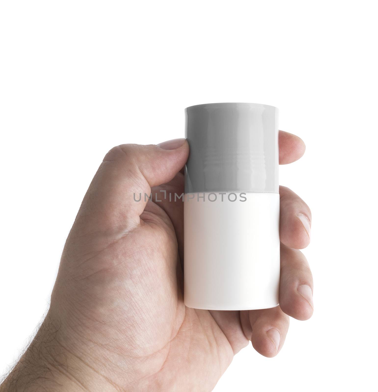 Tube deodorant in men hand isolated. With clipping path.