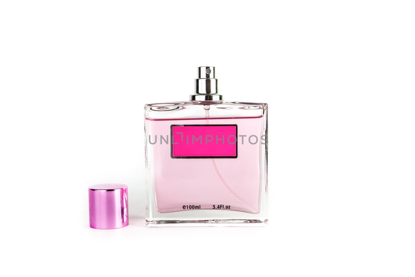 Perfume in beautiful rose color bottle isolated on white background
