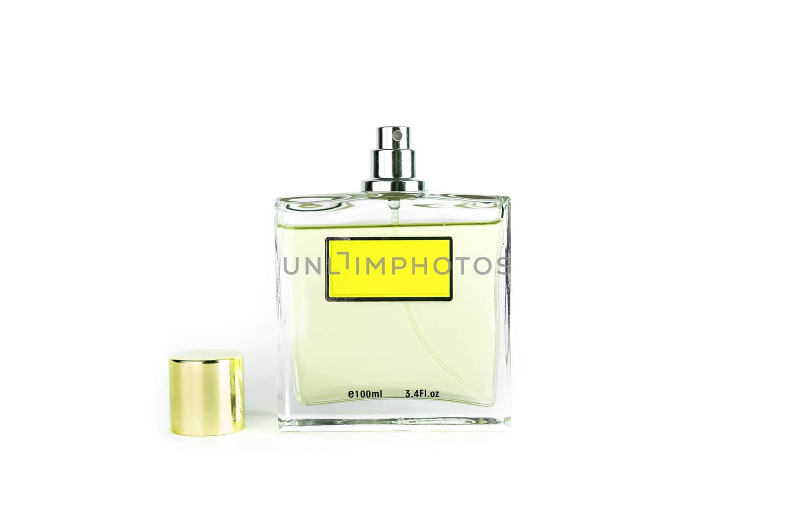 Perfume in beautiful yelow color bottle isolated on white background