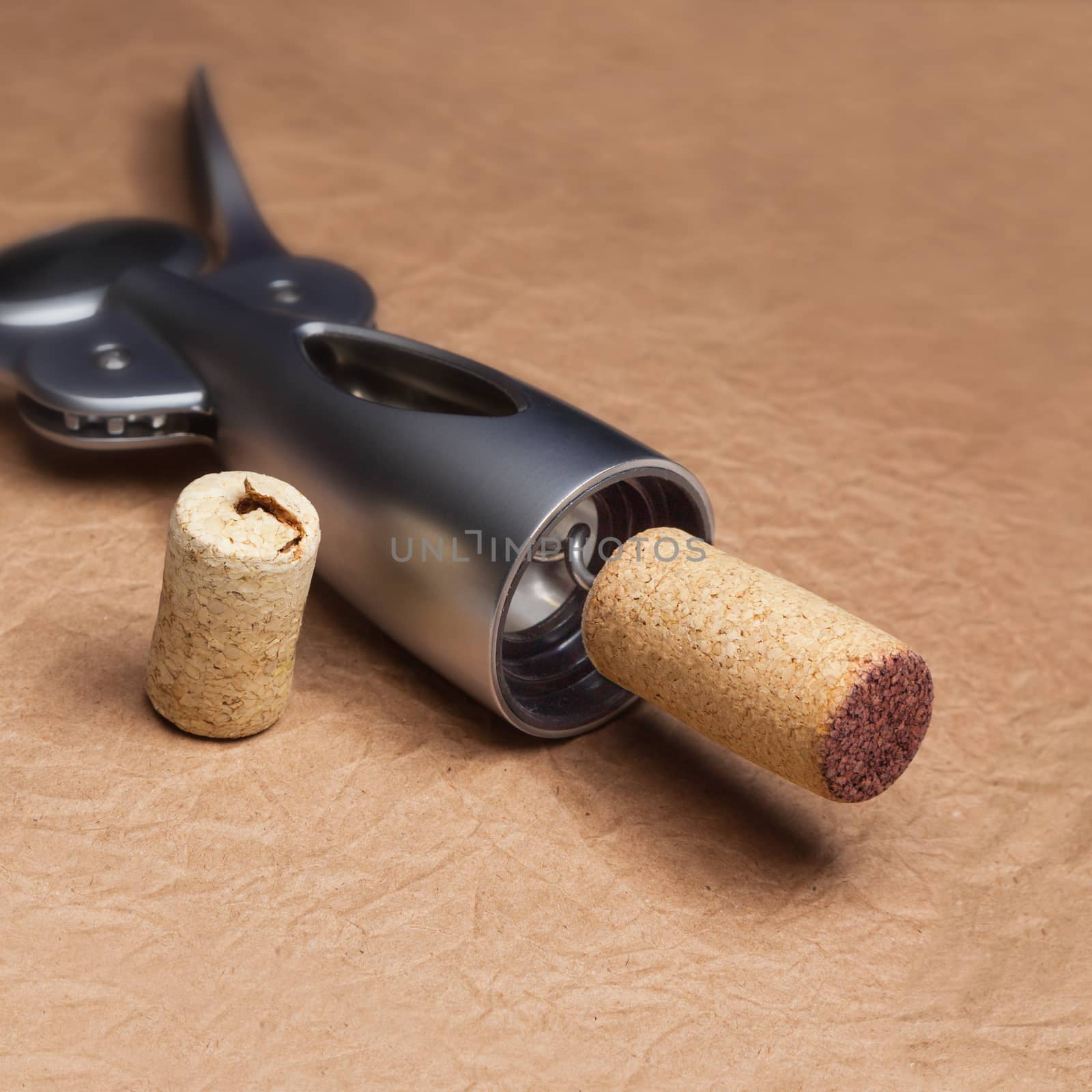 Uncork a bottle of wine, on brown background. by SlayCer