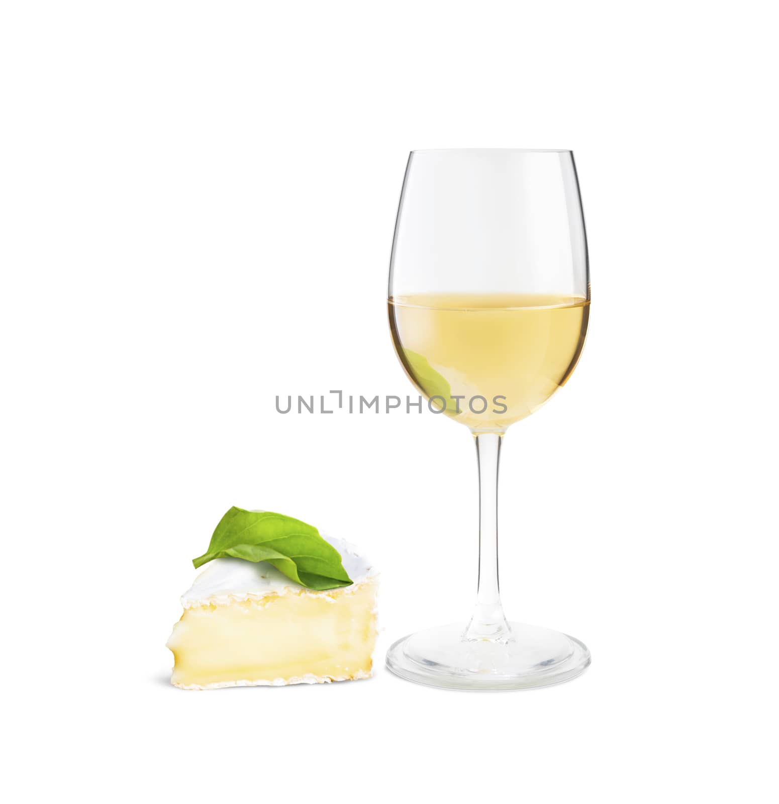 Glass of white wine and a slice of Camembert cheese. Isolated on white background.