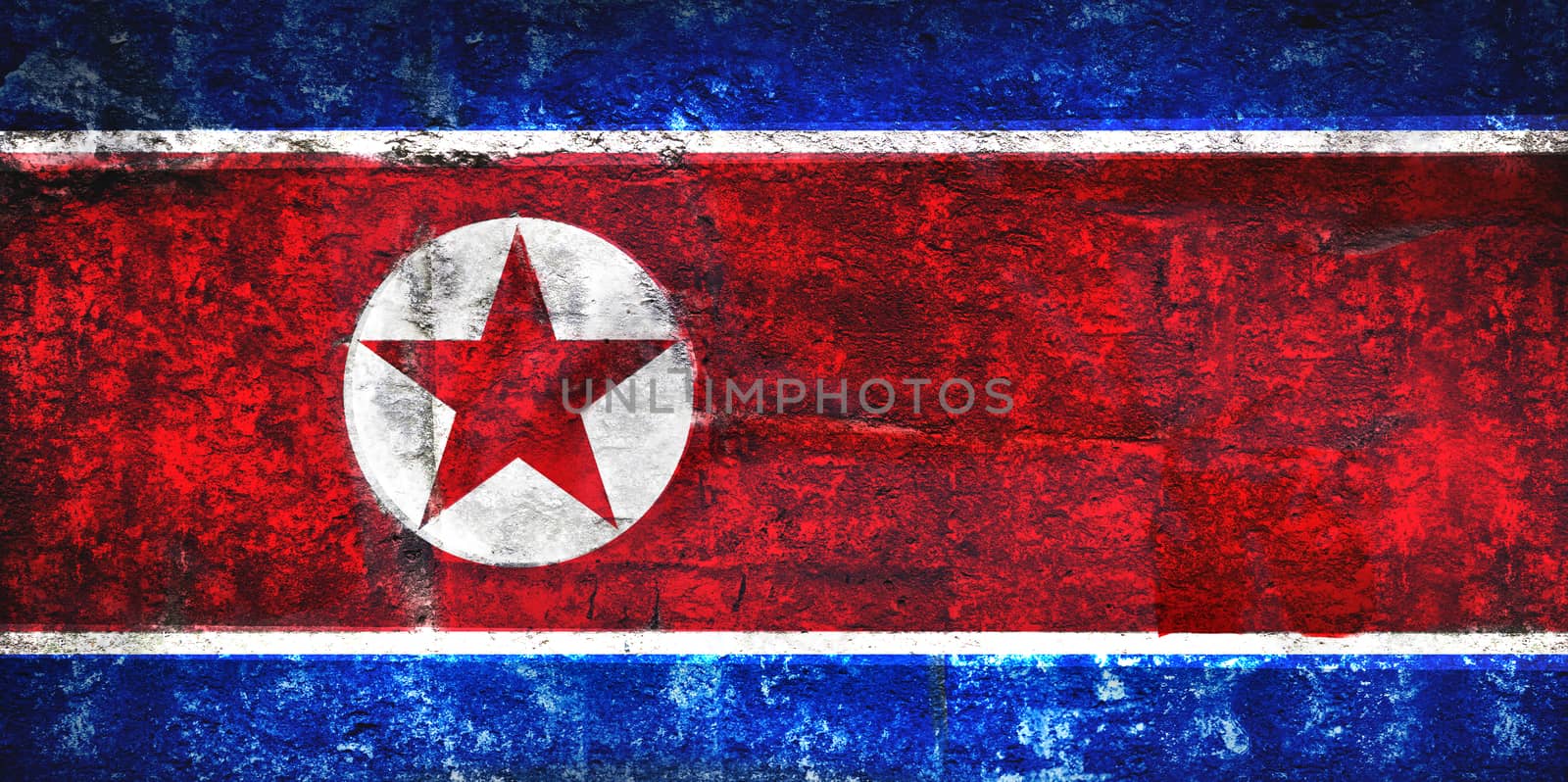 Grungy Flag of North Korea on stone texture background closeup