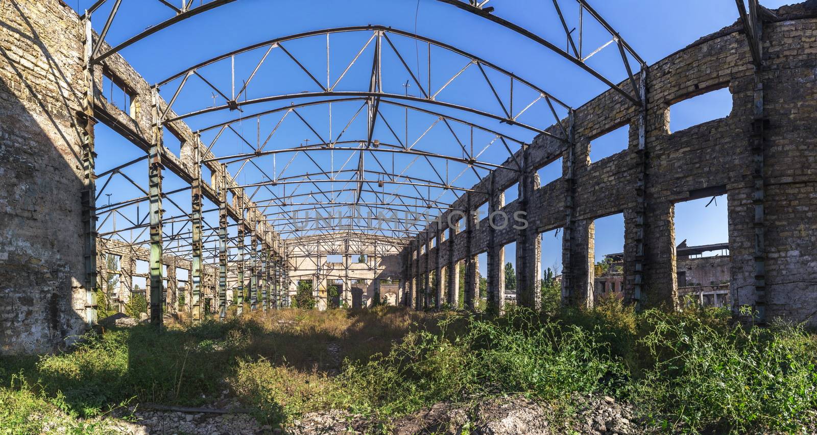 Old abandoned industrial factory Krayan in Odessa, Ukraine, in a sunny summer day