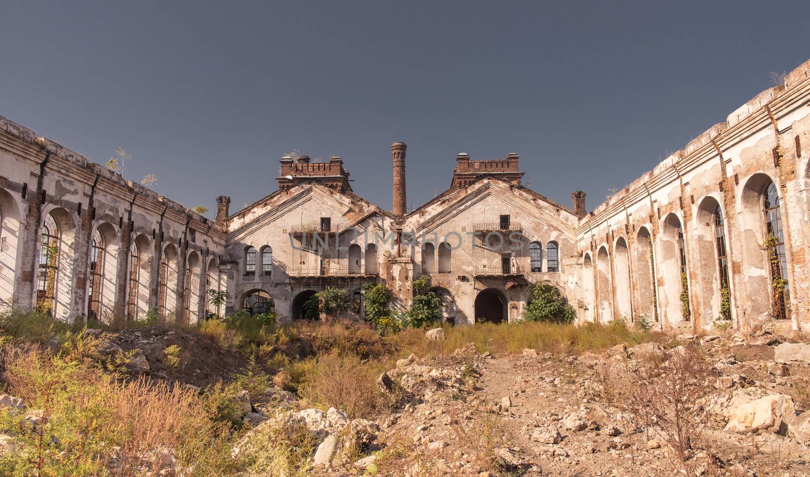 Old abandoned industrial factory Krayan in Odessa, Ukraine, in a sunny summer day