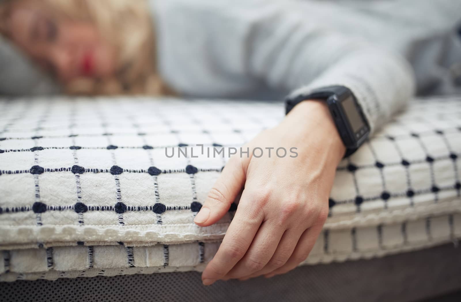 Woman sleeping with smart watch