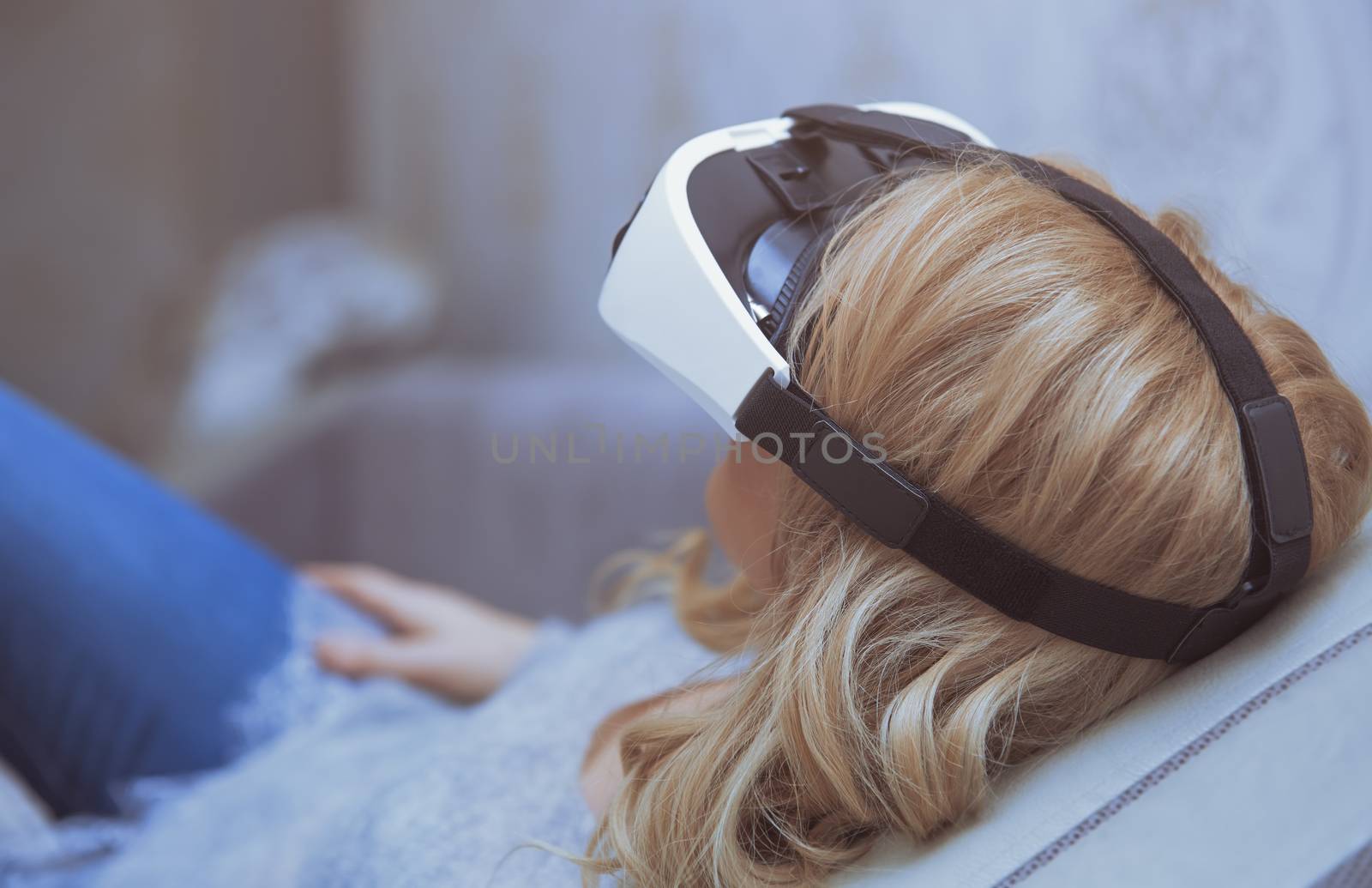 Woman wearing Virtual reality headset by Novic