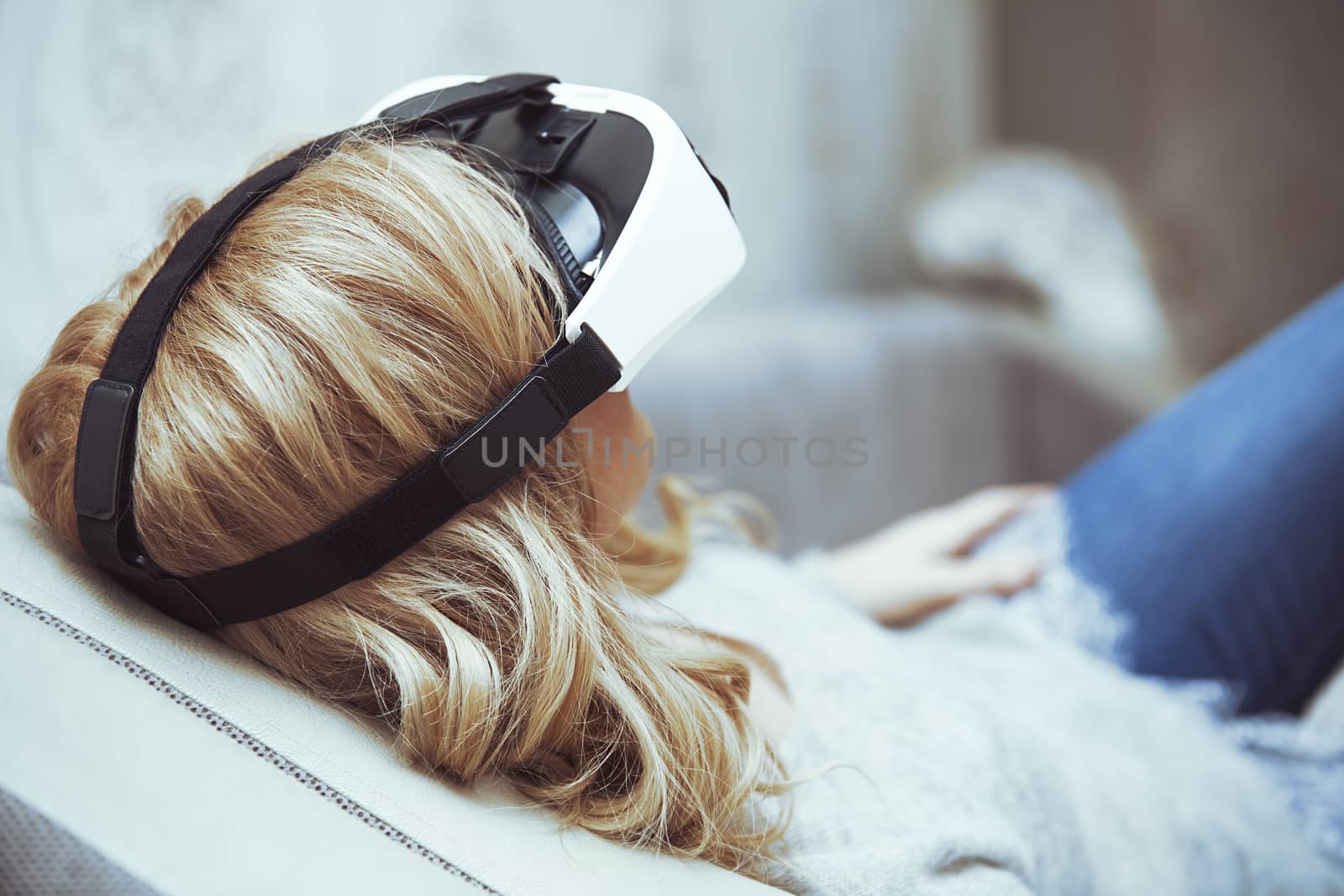 Woman wearing Virtual reality headset by Novic