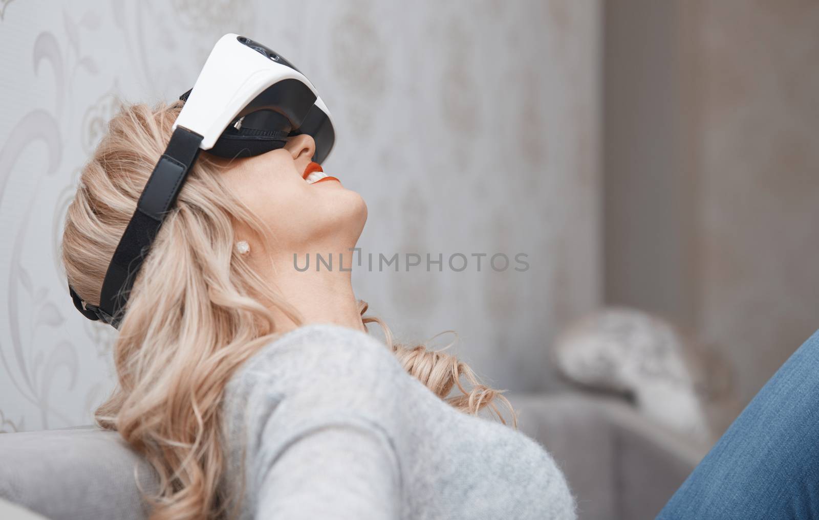 Woman wearing Virtual reality headset by Novic