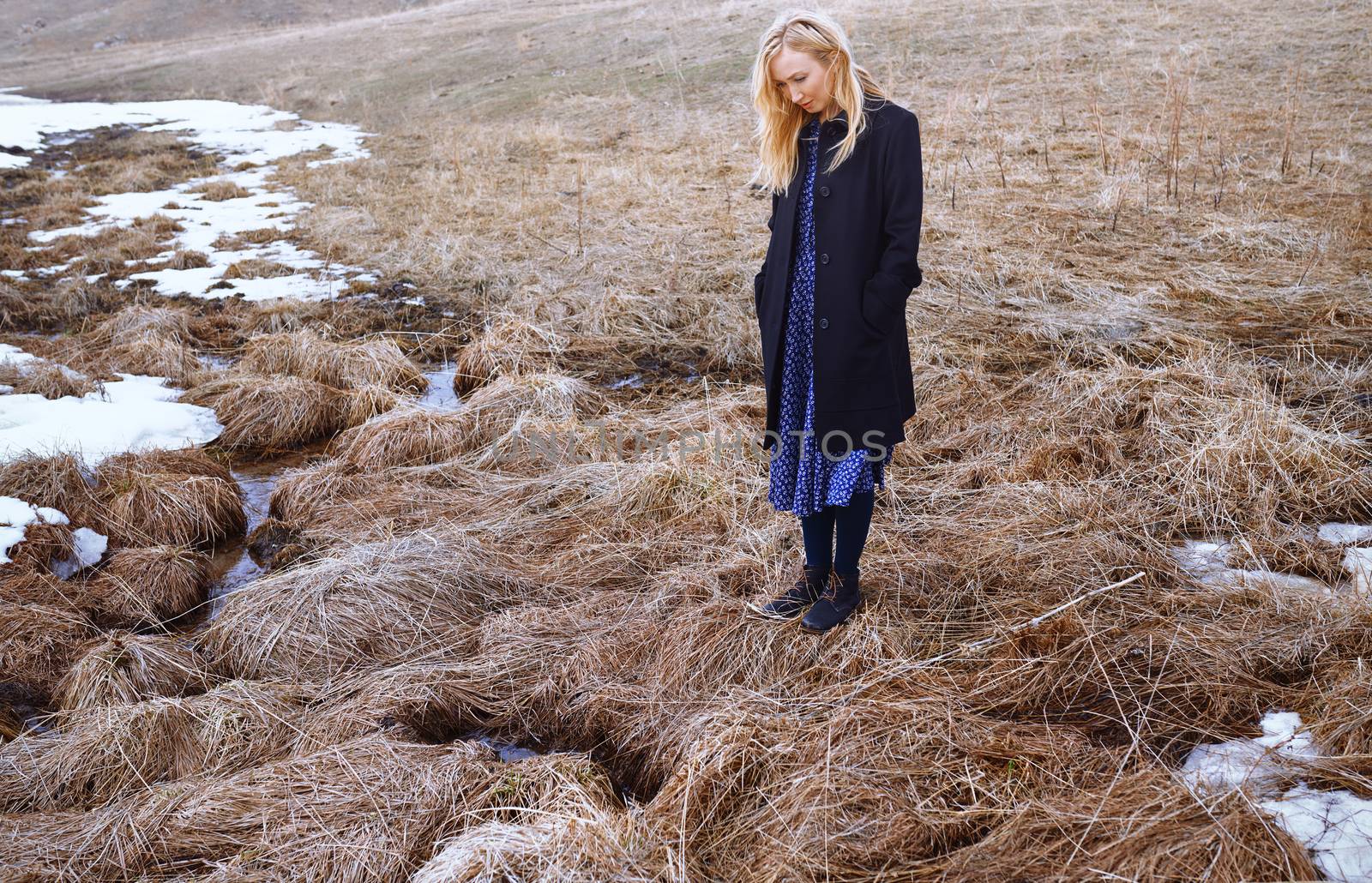 Woman standing at the swamp